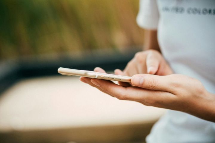 Person holding a cell phone